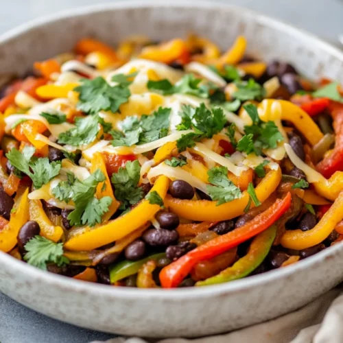 Quick &Amp; Healthy Black Bean Fajita Skillet For Two 2 Black Bean Fajita Skillet With Colorful Peppers And Onions, Garnished With Cilantro And Melted Cheese In A White Bowl