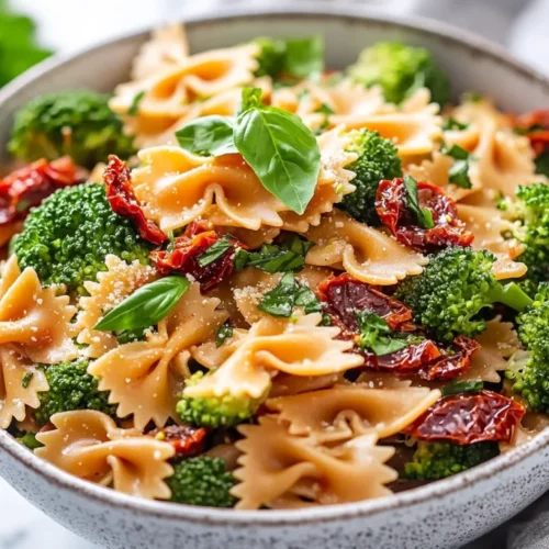 Broccoli Sun-Dried Tomato Pasta Salad: Healthy &Amp; Flavor-Packed Recipe 2 Bowl Of Broccoli Sun-Dried Tomato Pasta Salad With Fresh Herbs On A Light Marble Surface