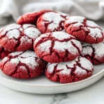 Fresh Gluten Free Red Velvet Crinkle Cookies On A White Plate, Dusted With Powdered Sugar And Showcasing Their Rich Texture