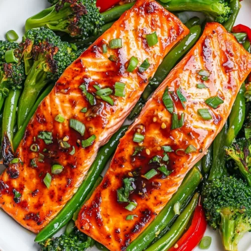 Salmon Traybake With Soy And Lime: Quick, Healthy, Delicious 2 Salmon Traybake With Soy And Lime On A White Plate With Spring Onion Garnish And Colorful Roasted Vegetables