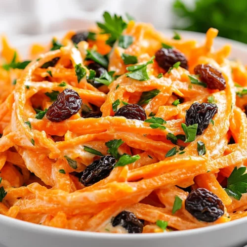 Healthy Carrot Salad With Raisins - Quick &Amp; Easy Recipe 2 Bowl Of Healthy Carrot Salad With Raisins Topped With Fresh Parsley On A White Background