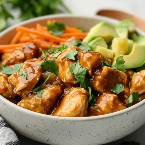 Crockpot Hawaiian Chicken: Healthy, Easy, And Delicious 2 Crockpot Hawaiian Chicken In A White Bowl Garnished With Cilantro, Avocado, And Shredded Carrots