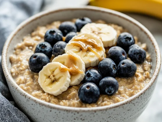 Easy And Healthy Instant Pot Steel Cut Oats Recipe 2 Bowl Of Instant Pot Steel Cut Oats Topped With Fresh Blueberries And Banana Slices, Drizzled With Almond Butter.