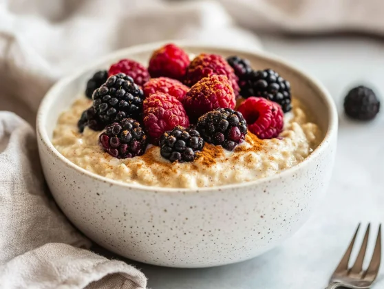 Easy Keto Porridge Recipe: Quick, Healthy &Amp; Low Carb Breakfast 2 Bowl Of Easy Keto Porridge Topped With Fresh Berries And Keto Honey, Served On A White Ceramic Bowl