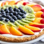Healthy Fruit Pizza Dessert With Fresh Fruit Toppings On A White Plate, Showcasing A Colorful And Nutritious Treat