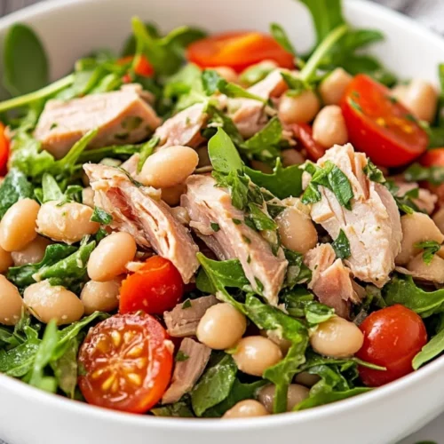 Herbed Tuna Salad With White Beans: Healthy Mediterranean Flavor 2 Herbed Tuna Salad With White Beans Served In A White Bowl, Topped With Basil And Dressed With Lemon-Garlic Sauce.