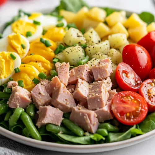 Tuna Nicoise Salad: A Healthy And Delicious Classic Recipe 2 Colorful Tuna Nicoise Salad On A White Plate With Potatoes, Green Beans, And Hard-Boiled Eggs