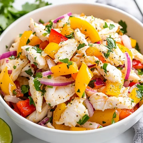 Zesty Lime Crab Salad – A Healthy &Amp; Flavorful Dish 2 Zesty Lime Crab Salad In A White Bowl Garnished With Fresh Cilantro And Lime Wedges, Vibrant And Colorful