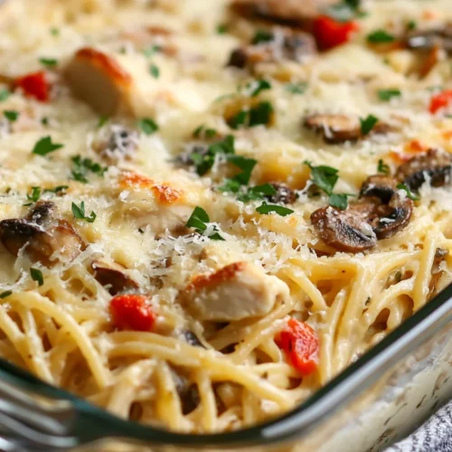The Best Chicken Tetrazzini Casserole Recipe For Healthy Meal Prep 2 Creamy Chicken Tetrazzini Casserole In A Glass Dish Topped With Golden Cheese And Fresh Parsley