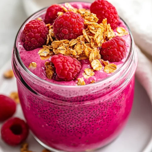 Raspberry Chia Pudding: The Perfect Healthy Breakfast Or Dessert 2 Delicious Raspberry Chia Pudding In A Glass Jar Topped With Fresh Raspberries And Granola On A White Plate