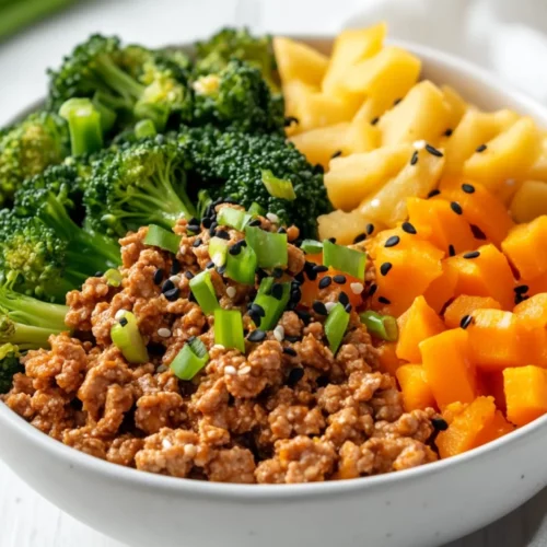 Turmeric Ginger Ground Turkey Bowls: Healthy &Amp; Flavorful Meal Prep 2 Colorful Turmeric Ginger Ground Turkey Bowls With Vegetables, Garnished With Green Onions On A White Plate